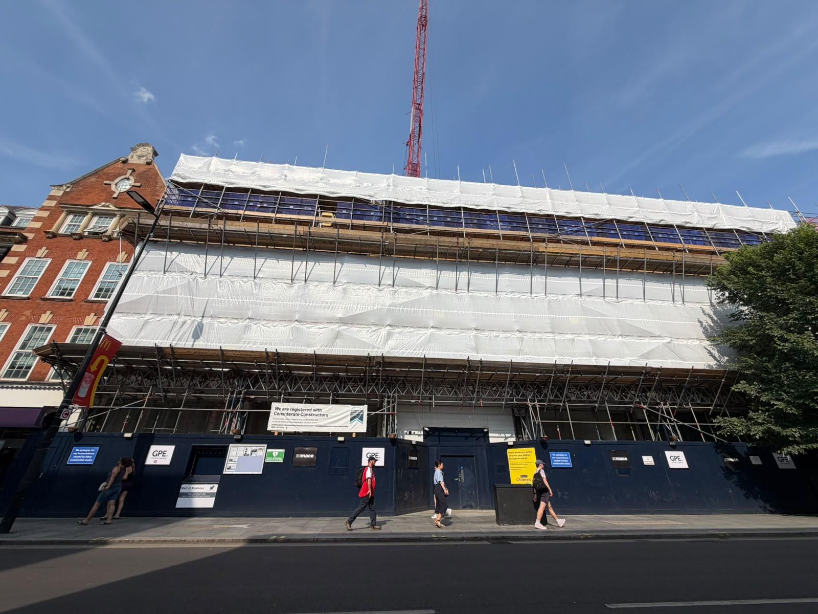 Façade retention and scaffolding at 1 Alfred Place, London